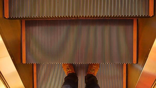 image of an escalator creates sense of movement